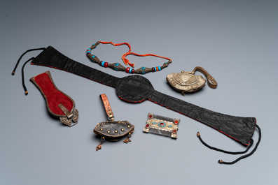 A group of six Tibetan objects of metals and textiles with gem stones, 19th C.