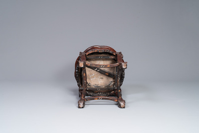 A Chinese carved wooden stand and a low table with marble tops, 19th C.