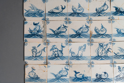 92 blue and white Dutch Delft tiles with sea monsters and ships, 18th C.