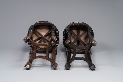 A pair of tall Chinese carved wooden stands with marble tops, 19th C.