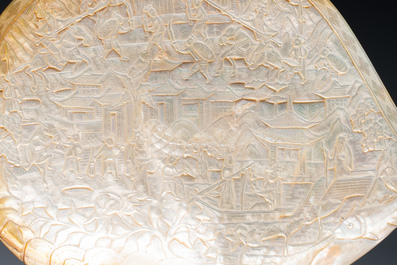 Five Chinese carved mother-of-pearl shells on wooden stands, Canton, 19th C.
