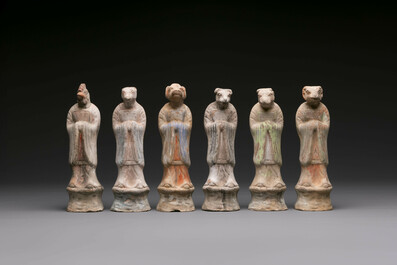 An impressive set of 12 Chinese cold painted terracotta zodiac figures, Ming