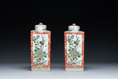 A Chinese blue and white bottle-shaped 'lotus scroll' vase and a pair of square famille verte flasks and covers, 19th C.