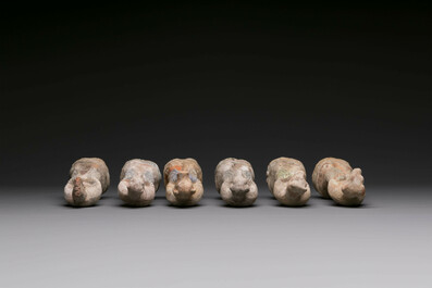An impressive set of 12 Chinese cold painted terracotta zodiac figures, Ming
