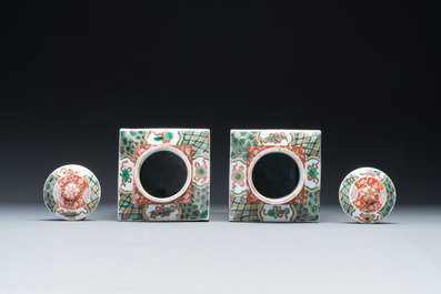 A Chinese blue and white bottle-shaped 'lotus scroll' vase and a pair of square famille verte flasks and covers, 19th C.