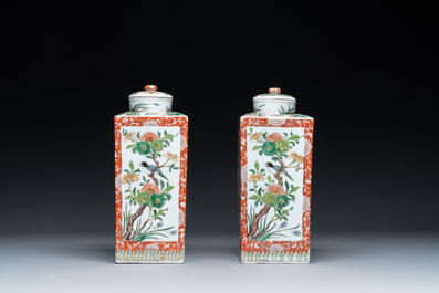 A Chinese blue and white bottle-shaped 'lotus scroll' vase and a pair of square famille verte flasks and covers, 19th C.