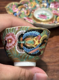 A Chinese Canton famille rose gilt-decorated cup and stand with flowers and butterflies, 19th C.