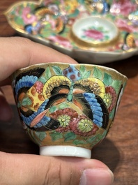 A Chinese Canton famille rose gilt-decorated cup and stand with flowers and butterflies, 19th C.