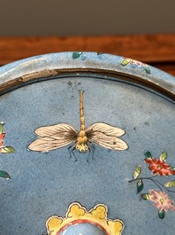 A Chinese Canton enamel circular hand mirror, early 19th C.