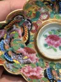 A Chinese Canton famille rose gilt-decorated cup and stand with flowers and butterflies, 19th C.