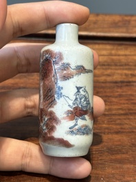A Chinese blue, white and copper-red snuff bottle with inscription, 19th C.