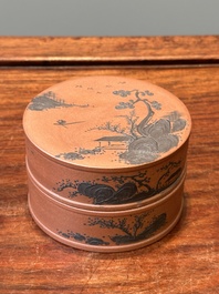 A Chinese blue-enameled Yixing stoneware box and cover with a mountainous landscape, 18/19th C.