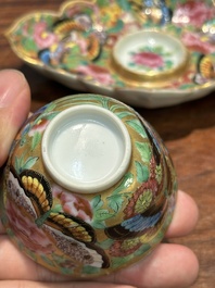 A Chinese Canton famille rose gilt-decorated cup and stand with flowers and butterflies, 19th C.