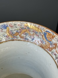 A pair of Chinese Canton famille rose spittoons with dragons, birds, butterflies and flowers, 19th C.