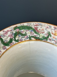 A pair of Chinese Canton famille rose spittoons with dragons, birds, butterflies and flowers, 19th C.