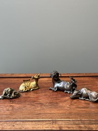 A group of four Chinese gilt bronze paper-weights, Ming/Qing