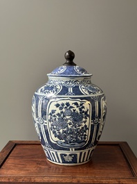 A Chinese blue and white jar and cover with floral design, Wanli