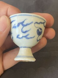 Five Chinese blue and white 'Hatcher cargo' stem cups with dragons, Transitional period