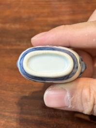 Three Chinese blue and white snuff bottles, Yongzheng mark, 19th C.