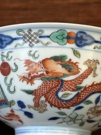 A Chinese wucai 'dragon and phoenix' bowl, Daoguang mark and of the period