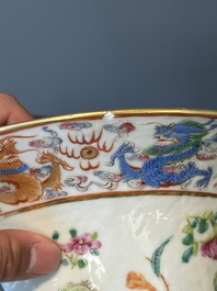 A pair of Chinese Canton famille rose spittoons with dragons, birds, butterflies and flowers, 19th C.