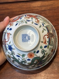 A Chinese wucai 'dragon and phoenix' bowl, Daoguang mark and of the period