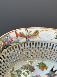 A Chinese Canton famille rose reticulated basket and stand, 19th C.