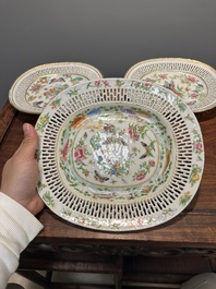 Three Chinese Canton famille rose reticulated oval dishes with flowers, butterflies and marine animals, 19th C.