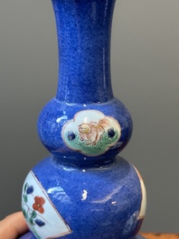 A pair of Chinese famille verte powder-blue-ground triple gourd 'antiquities' vases, Kangxi