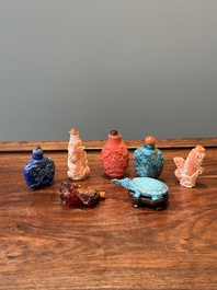 Seven varied Chinese snuff bottles of precious stone, red coral, glass and amber, 19th C.