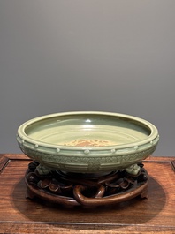 A large Chinese Longquan celadon 'trigrams' censer on wooden stand, Ming