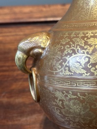 A Chinese brown-glazed 'hu' vase with gilt flower scrolls, Jiaqing mark and of the period