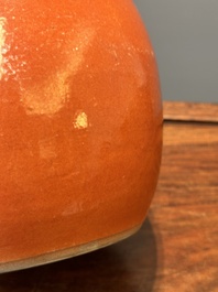 A Chinese monochrome coral-red-glazed ginger jar with wooden cover, 18th C.