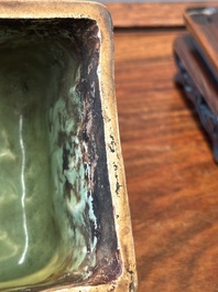 A Chinese Longquan celadon rectangular censer and cover on wooden stand, Ming