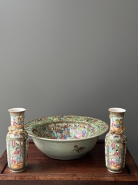 A Chinese Canton famille rose basin and a pair of vases with narrative design, 19th C.