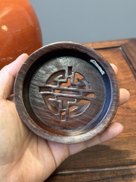 A Chinese monochrome coral-red-glazed ginger jar with wooden cover, 18th C.