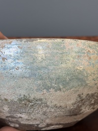 A Chinese monochrome green-glazed pottery scoop, Han