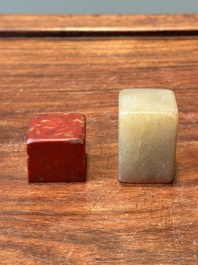 A Chinese 'chicken blood' soapstone seal and a russet jade seal, Qing