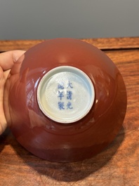 A pair of Chinese monochrome ruby-glazed bowls, Guangxu mark and of the period