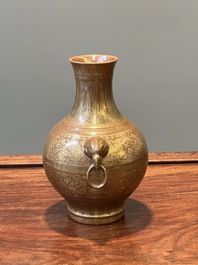 A Chinese brown-glazed 'hu' vase with gilt flower scrolls, Jiaqing mark and of the period