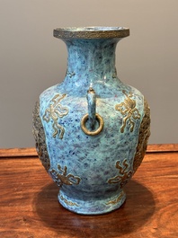 A Chinese robin's egg and faux bronze-glazed 'hu' vase, Qianlong mark, 19th C.