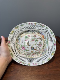 A Chinese Canton famille rose reticulated basket and stand, 19th C.