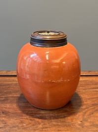 A Chinese monochrome coral-red-glazed ginger jar with wooden cover, 18th C.