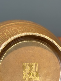 A Chinese brown-glazed 'hu' vase with gilt flower scrolls, Jiaqing mark and of the period