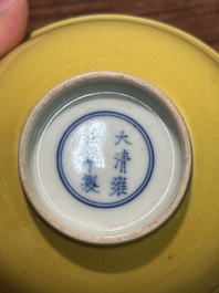 A pair of Chinese monochrome yellow-glazed bowls, Yongzheng mark, 19th C