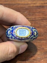 A Chinese Canton enamel 'European scene' snuff bottle, Qianlong mark, 19th C.