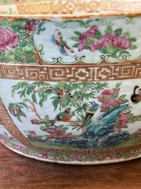 A Chinese Canton famille rose bowl and a covered bottle vase, 19th C.