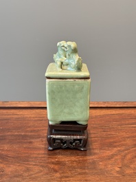 A Chinese Longquan celadon rectangular censer and cover on wooden stand, Ming