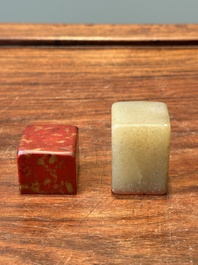 A Chinese 'chicken blood' soapstone seal and a russet jade seal, Qing