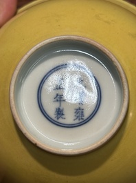 A pair of Chinese monochrome yellow-glazed bowls, Yongzheng mark, 19th C